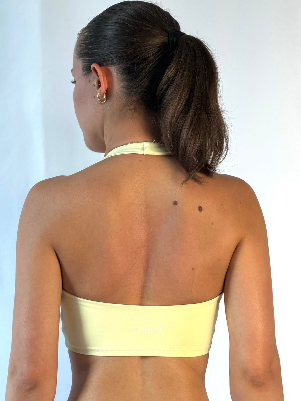 SoftEra™ - Halter sports bra in Butter Yellow