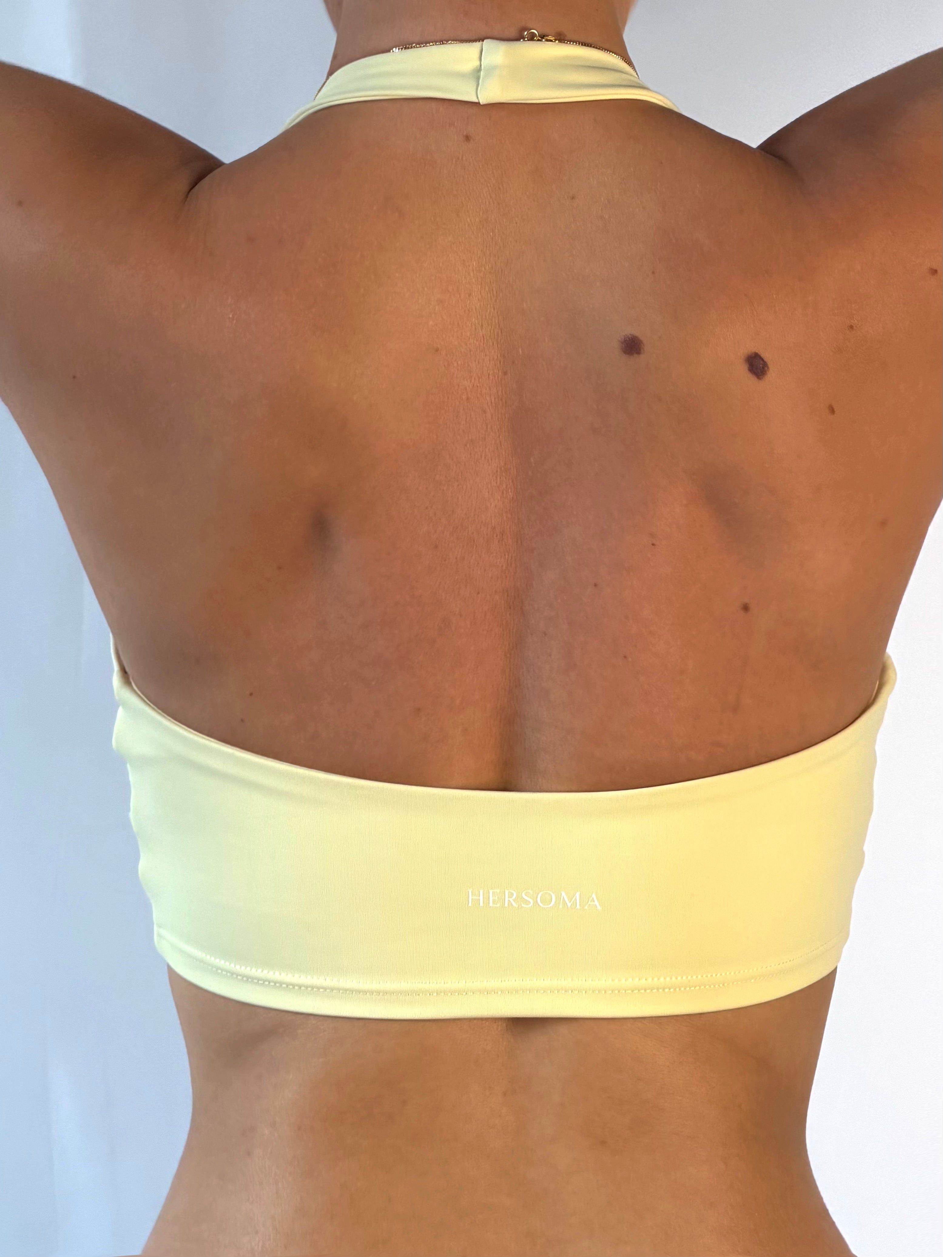 SoftEra™ - Halter sports bra in Butter Yellow