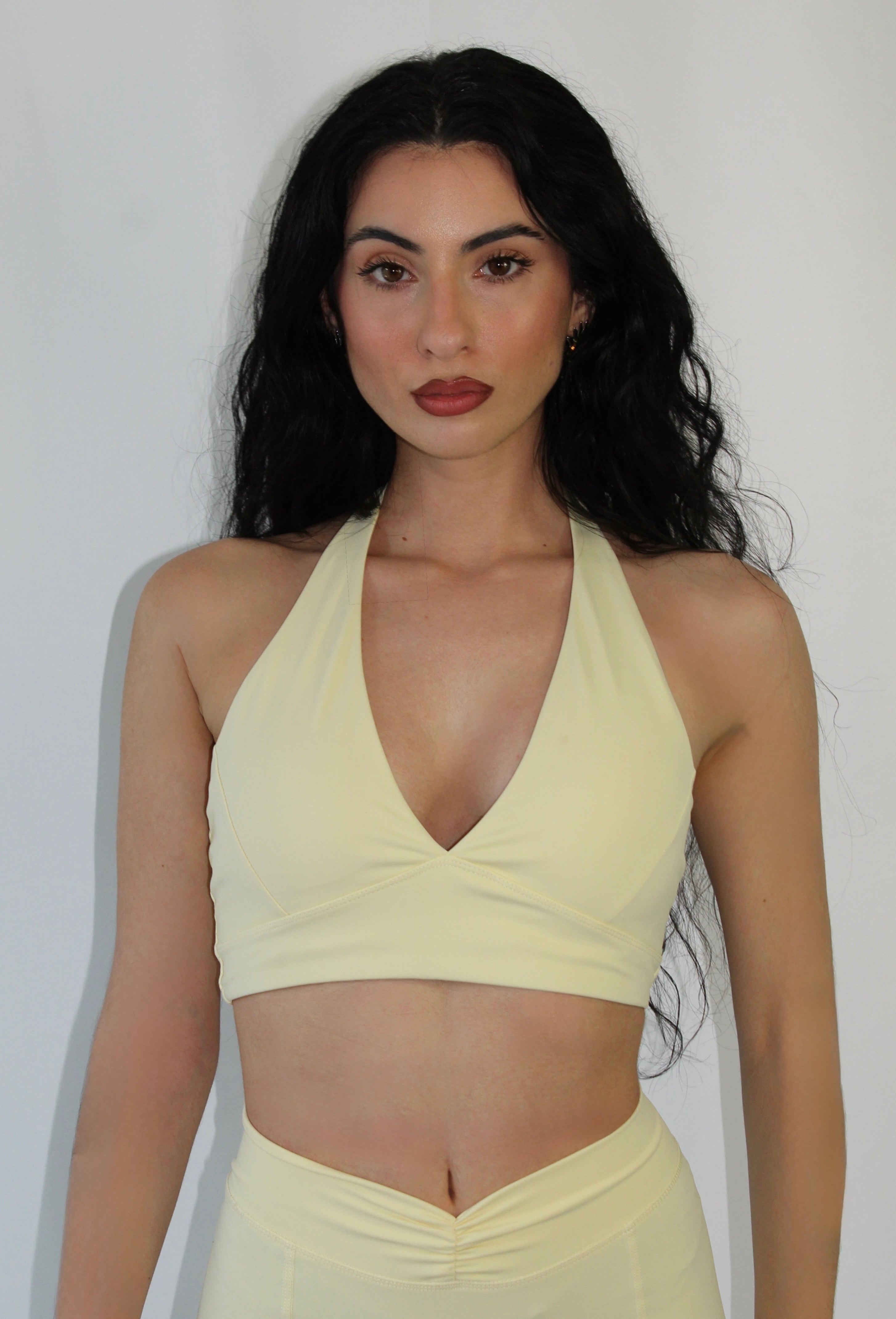 SoftEra™ - Halter sports bra in Butter Yellow